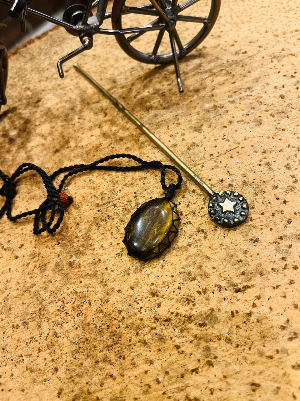 Tiger eye pendant in macrame cord